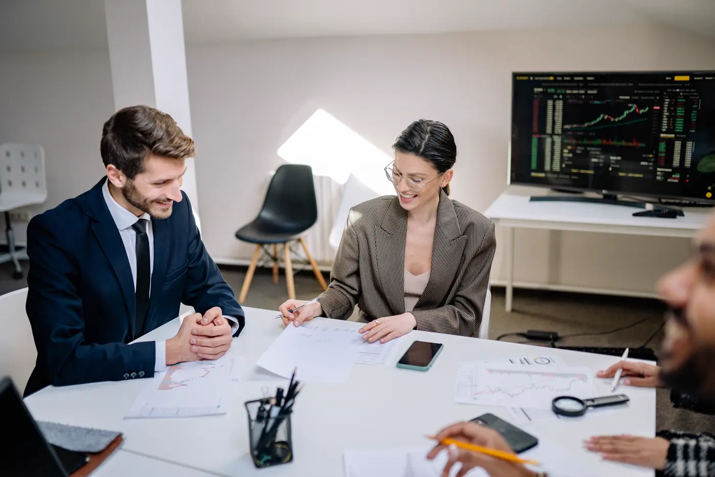 A leadership team collaborating in a modern office
